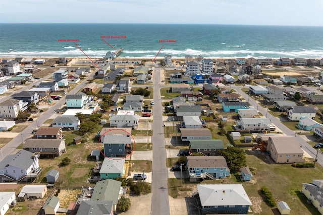 aerial view with a residential view and a water view