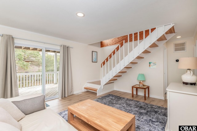 630 Skimmer Ct Lot 20, Corolla, NC 27927 - living room featuring stairs, baseboards, recessed lighting, and light wood finished floors