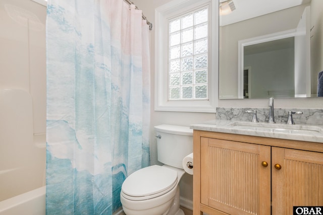 630 Skimmer Ct Lot 20, Corolla, NC 27927 - full bathroom with plenty of natural light, toilet, vanity, and shower / bathtub combination with curtain