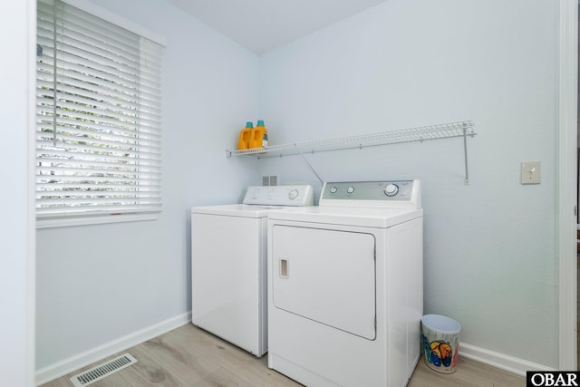 630 Skimmer Ct Lot 20, Corolla, NC 27927 - washroom featuring light wood finished floors, independent washer and dryer, and baseboards