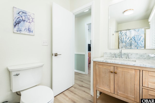 630 Skimmer Ct Lot 20, Corolla, NC 27927 - bathroom featuring wood finished floors, toilet, and vanity