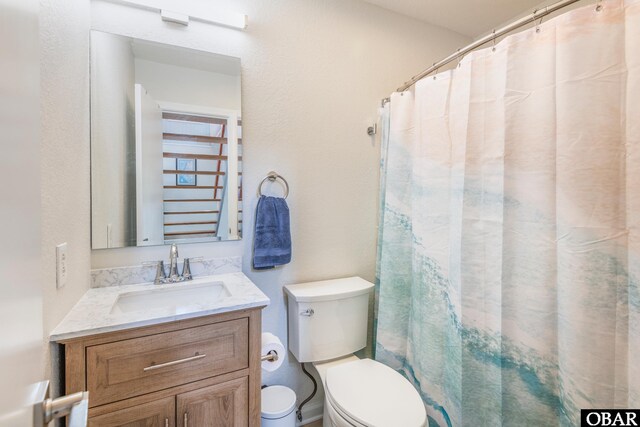 630 Skimmer Ct Lot 20, Corolla, NC 27927 - full bathroom featuring vanity, toilet, and curtained shower