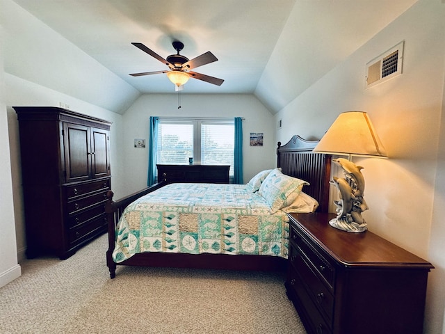 bedroom with baseboards, visible vents, a ceiling fan, light colored carpet, and lofted ceiling