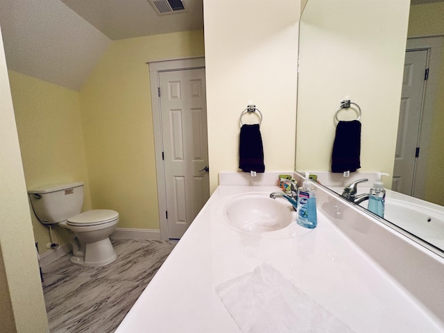 bathroom with visible vents, toilet, marble finish floor, vanity, and a closet