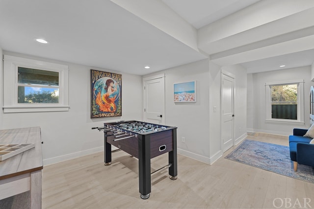 rec room with recessed lighting, light wood-type flooring, a wealth of natural light, and baseboards