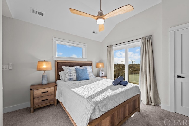 bedroom featuring light carpet, vaulted ceiling, and visible vents