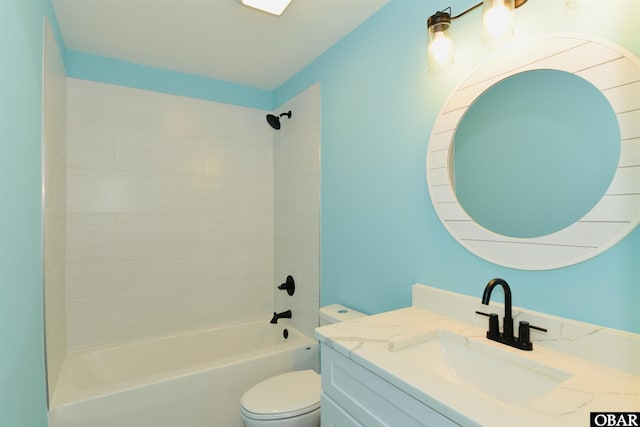 bathroom with vanity, toilet, and tub / shower combination