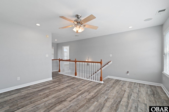 121 Bayside Dr Lot # 71, Moyock, NC 27958 - unfurnished room featuring wood finished floors, plenty of natural light, ceiling fan, and recessed lighting