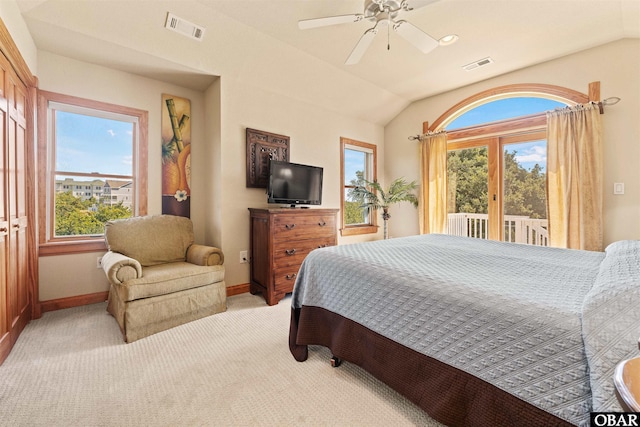 bedroom with access to exterior, visible vents, and lofted ceiling