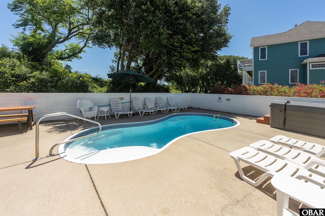 view of pool featuring a fenced in pool, a patio, and fence