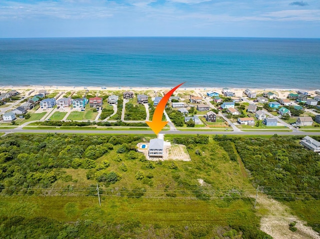 aerial view featuring a water view and a residential view