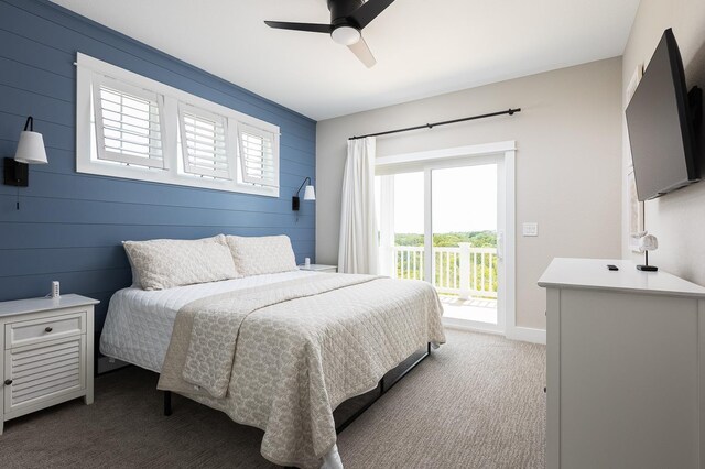 bedroom with access to outside, carpet flooring, ceiling fan, and baseboards