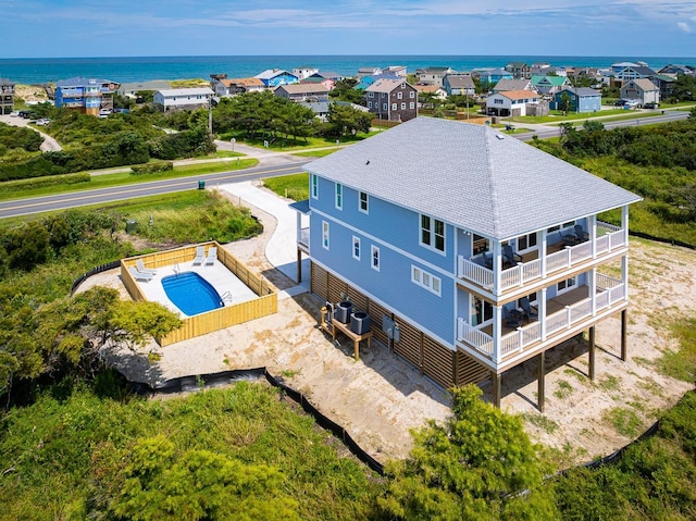 bird's eye view with a water view