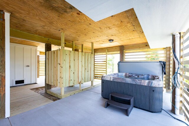 view of patio / terrace featuring a hot tub