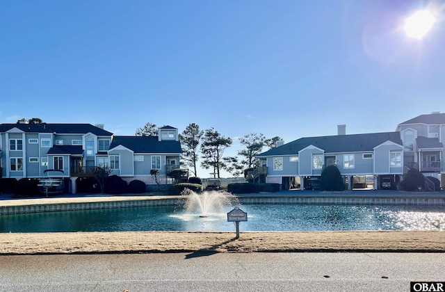 view of pool featuring a residential view