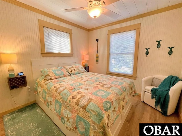 104 Sand Dollar Rd Lot # 23, Ocracoke, NC 27960 - bedroom with ornamental molding, wood finished floors, and a ceiling fan