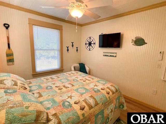 104 Sand Dollar Rd Lot # 23, Ocracoke, NC 27960 - bedroom with ornamental molding, wood finished floors, and a ceiling fan