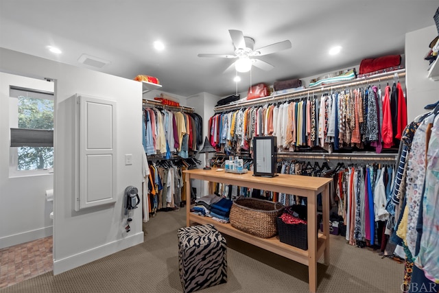 spacious closet with ceiling fan