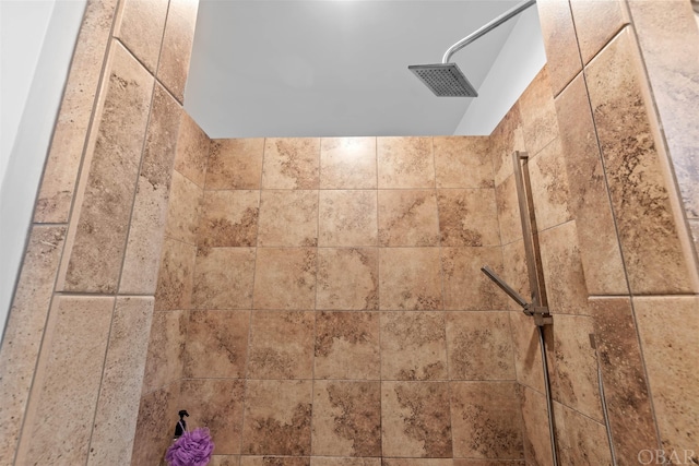 details with a tile shower