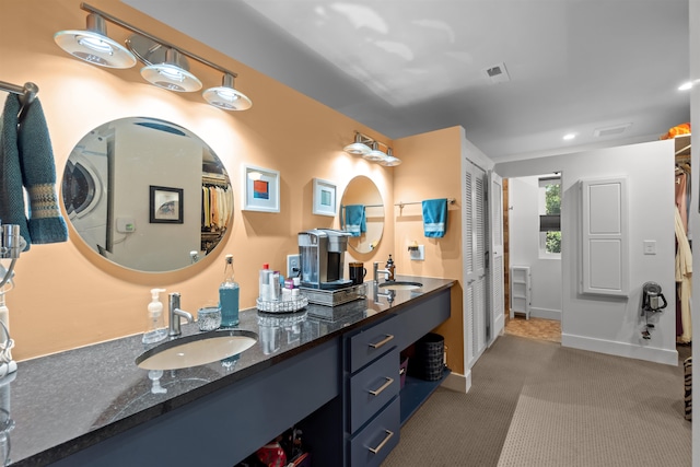 106 Prince Charles Ct Lot 45, Kill Devil Hills, NC 27948 - bathroom with vanity and baseboards