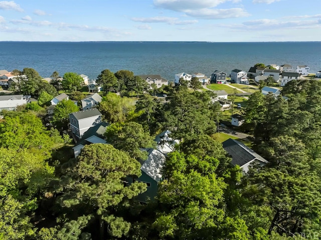 drone / aerial view with a residential view and a water view