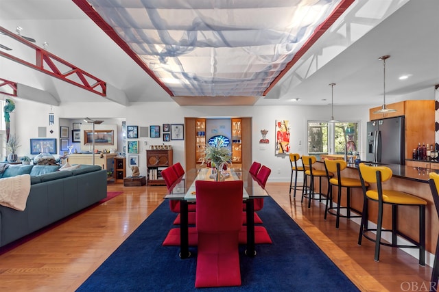 dining area with wood finished floors