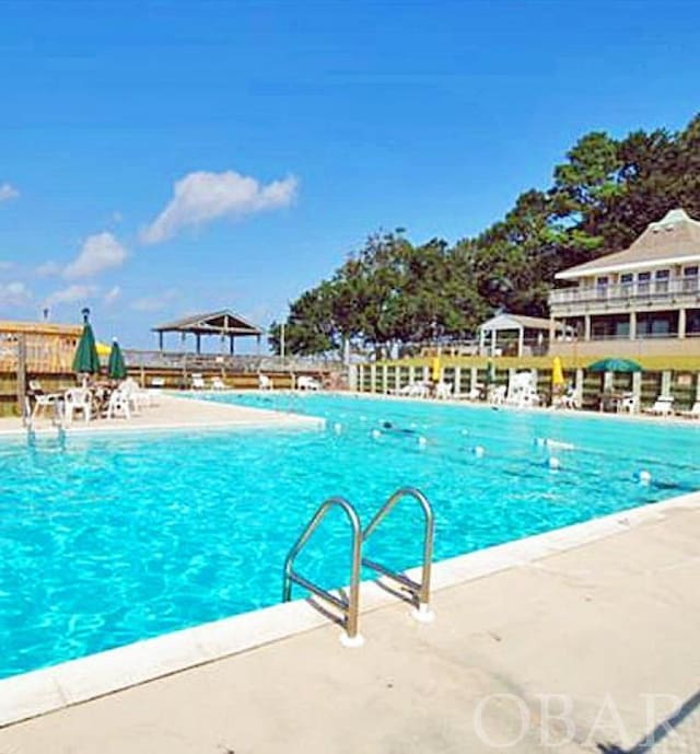 pool featuring a gazebo