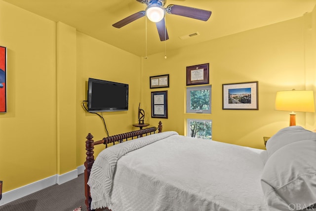 bedroom with a ceiling fan, baseboards, visible vents, and carpet flooring