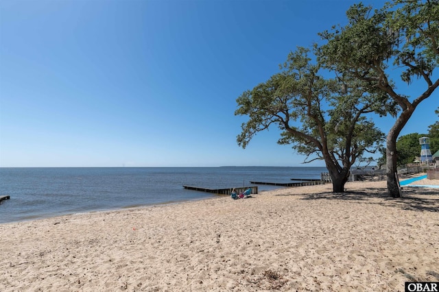 view of water feature with a beach view