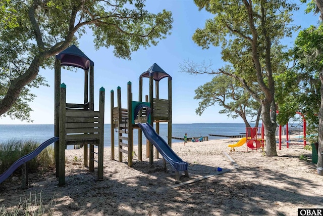 community playground featuring a water view