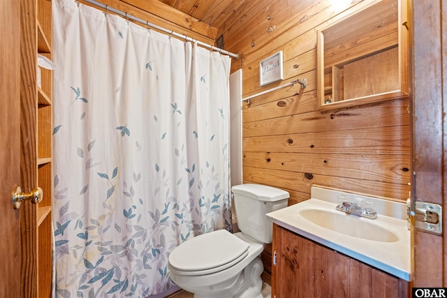 full bathroom featuring wooden walls, toilet, vanity, and a shower with curtain