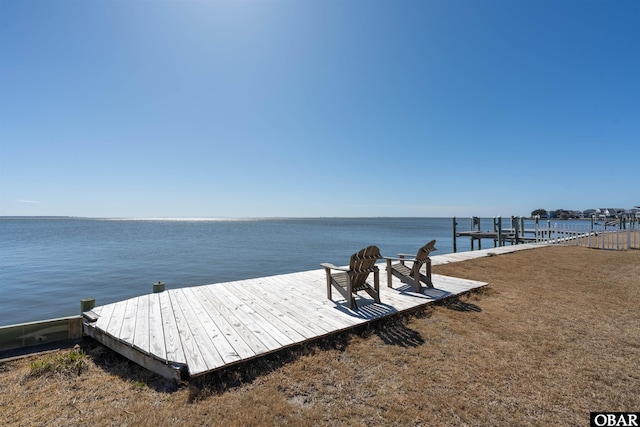 dock area featuring a water view