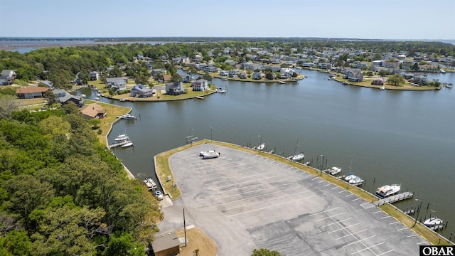 aerial view featuring a residential view and a water view