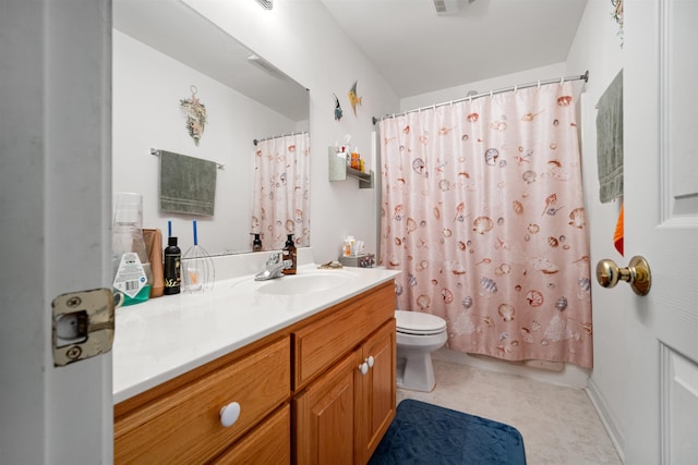 bathroom with toilet, visible vents, and vanity