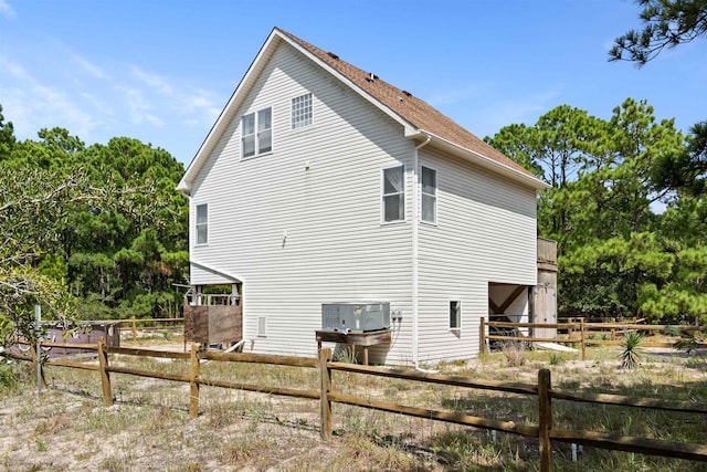 view of home's exterior featuring central AC unit