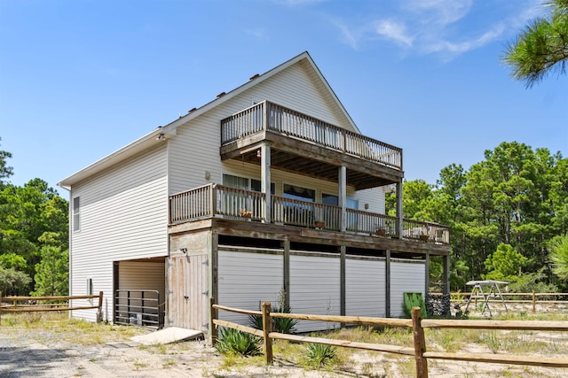 back of property with an outbuilding and an exterior structure