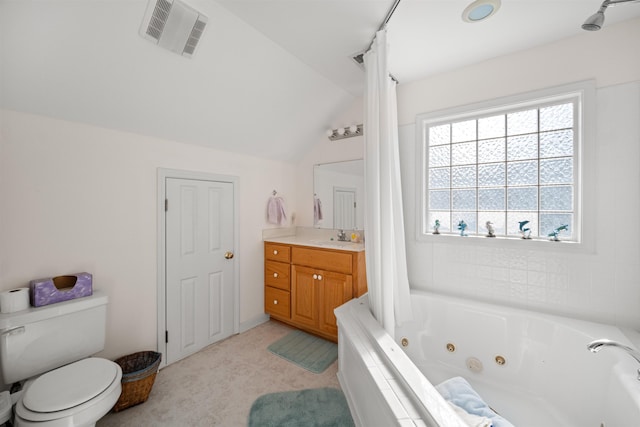 bathroom with visible vents, vaulted ceiling, vanity, and toilet