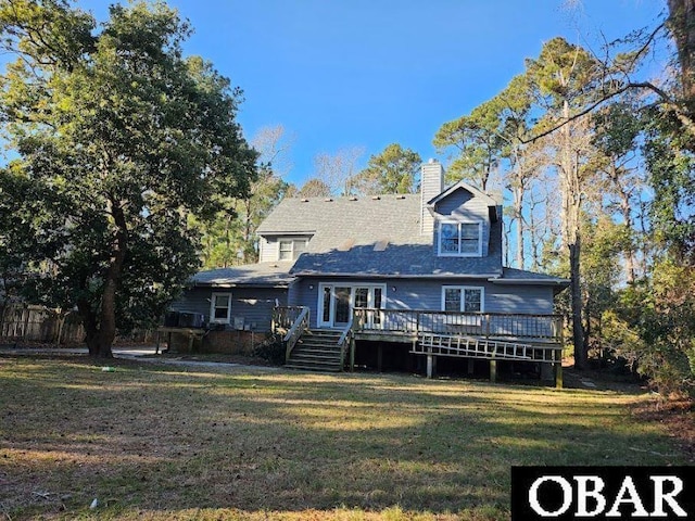 7013 Currituck Rd Lot 4, Kitty Hawk, NC 27949 - back of house featuring a lawn, a deck, a chimney, and french doors