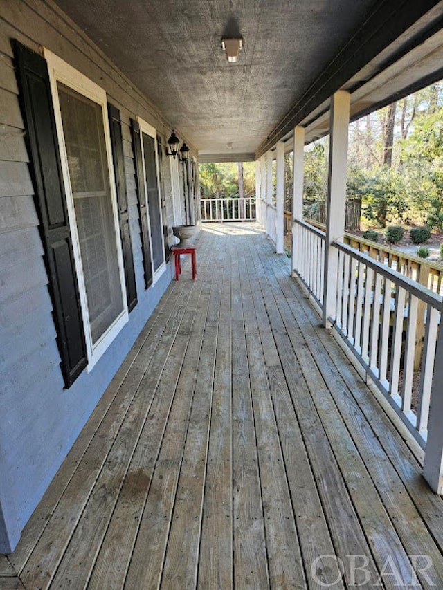 deck featuring covered porch