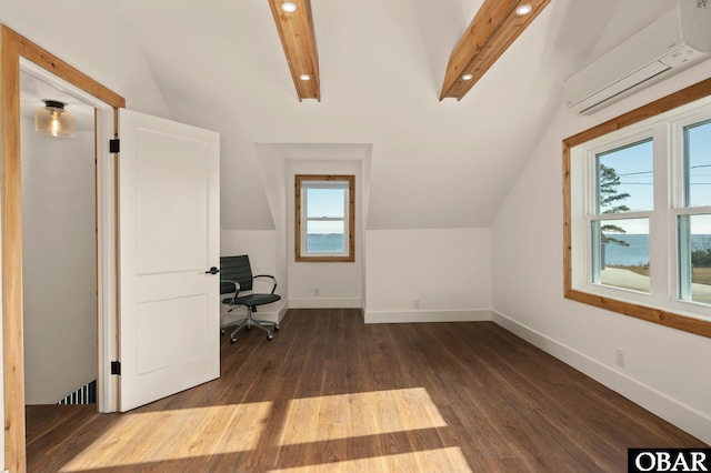 unfurnished office featuring dark wood finished floors, lofted ceiling with beams, baseboards, and a wall mounted AC
