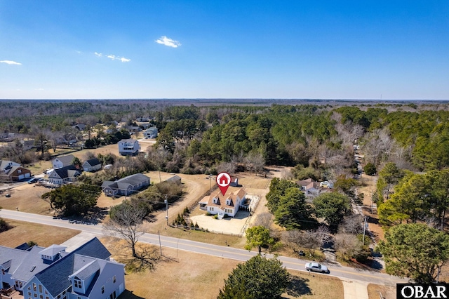 aerial view featuring a view of trees