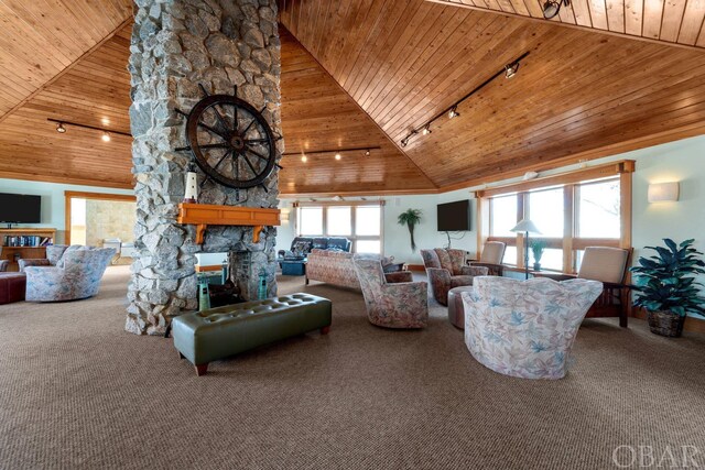 living area featuring high vaulted ceiling, carpet, and wood ceiling