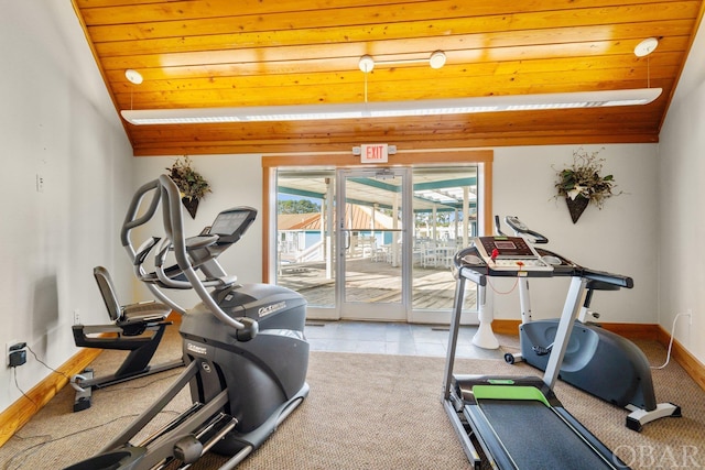 exercise room featuring vaulted ceiling, light carpet, wood ceiling, and baseboards