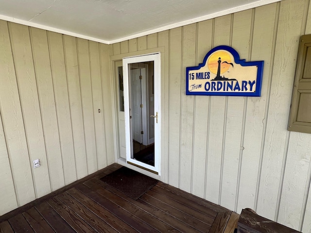 doorway to property with board and batten siding