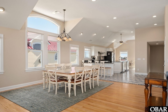 7239 S Old Oregon Inlet Rd Lot 1, Nags Head, NC 27959 - dining room featuring plenty of natural light, light wood finished floors, a ceiling fan, lofted ceiling, and baseboards