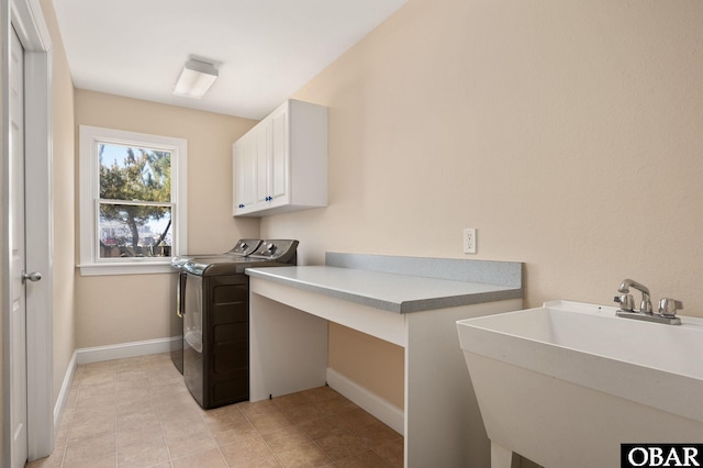 7239 S Old Oregon Inlet Rd Lot 1, Nags Head, NC 27959 - laundry area with cabinet space, separate washer and dryer, a desk, baseboards, and light tile patterned floors