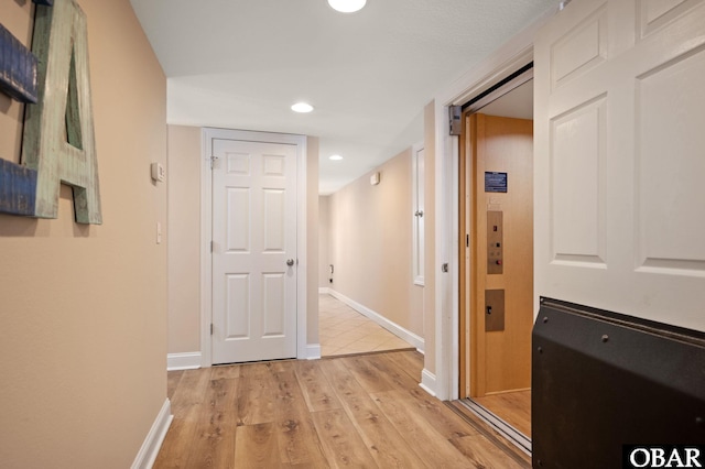7239 S Old Oregon Inlet Rd Lot 1, Nags Head, NC 27959 - hallway with light wood-style flooring, baseboards, and recessed lighting