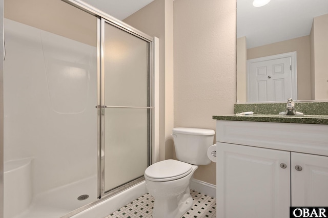 7239 S Old Oregon Inlet Rd Lot 1, Nags Head, NC 27959 - full bathroom featuring a shower stall, toilet, vanity, and baseboards
