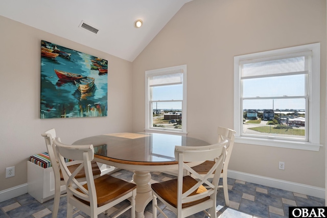7239 S Old Oregon Inlet Rd Lot 1, Nags Head, NC 27959 - dining room featuring baseboards and high vaulted ceiling