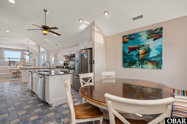 7239 S Old Oregon Inlet Rd Lot 1, Nags Head, NC 27959 - dining room with vaulted ceiling, a chandelier, ceiling fan, and recessed lighting